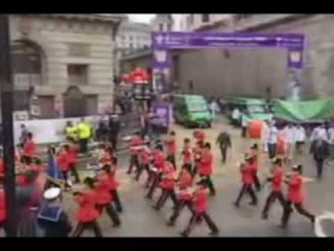 A three-mile long procession of more than 6000 performers wound through the streets of the Square Mile to introduce the 681st Lord Mayor of the City of London, Ian Luder. A military flypast over Mansion House marked the beginning of the parade. Mr Luder was then carried, in the 251-year-old gold State Coach, to St Paul's Cathedral where he was blessed by the Dean of St Paul's. More than 200 vehicles took part in the parade, including a Sherman tank from World War Two, vintage buses, two steamrollers, taxis, a fleet of Morris Minors and a horse-drawn Santa carriage.