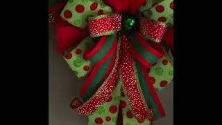 Singing Grinch Christmas wreath with lights on