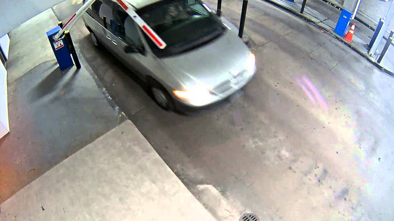 Car Plows Through Parking Gate Arm