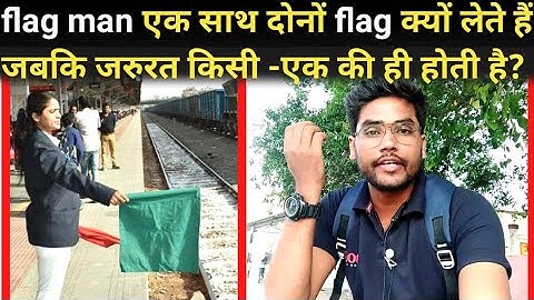 why do loco pilots wave green flags when two trains are crossing each other