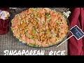 Singaporean rice cook with umbreen combination of rice and noodles unique recipe