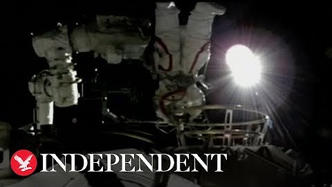 Chinese astronauts assemble robotic arm in first space walk