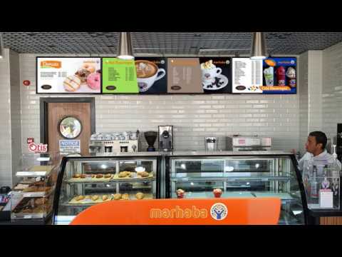 مرحبا ماركت 4 شاشات منيوبورد بمحطة بنزين أويل ليبيا بالشروق