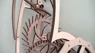 This wooden gear clock was designed by Jeff Schierenbeck and is available as a kit from www.wooden-gear-clocks.com. It features 