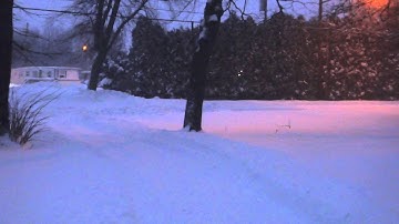 Saturn Vue plowing through the snow