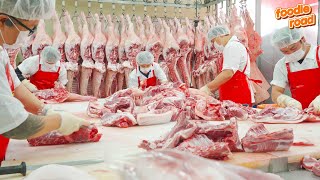 a large food factory / The process of pork ribs being broken down