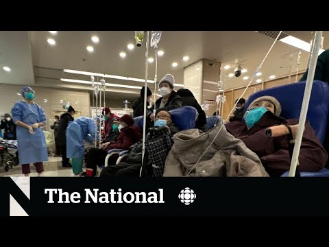 Patients flood China’s hospitals amid COVID-19 surge