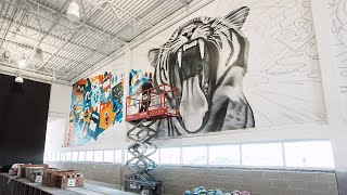 Street Artist GREG MIKE Paints 90ft Mural in Iowa.