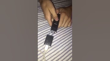Person uses a taser to charge phone