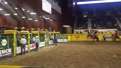 Calvin Schaffer competes in saddle bronc riding at...