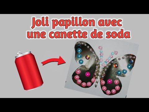 Jolis papillons décoratifs avec une canette de soda