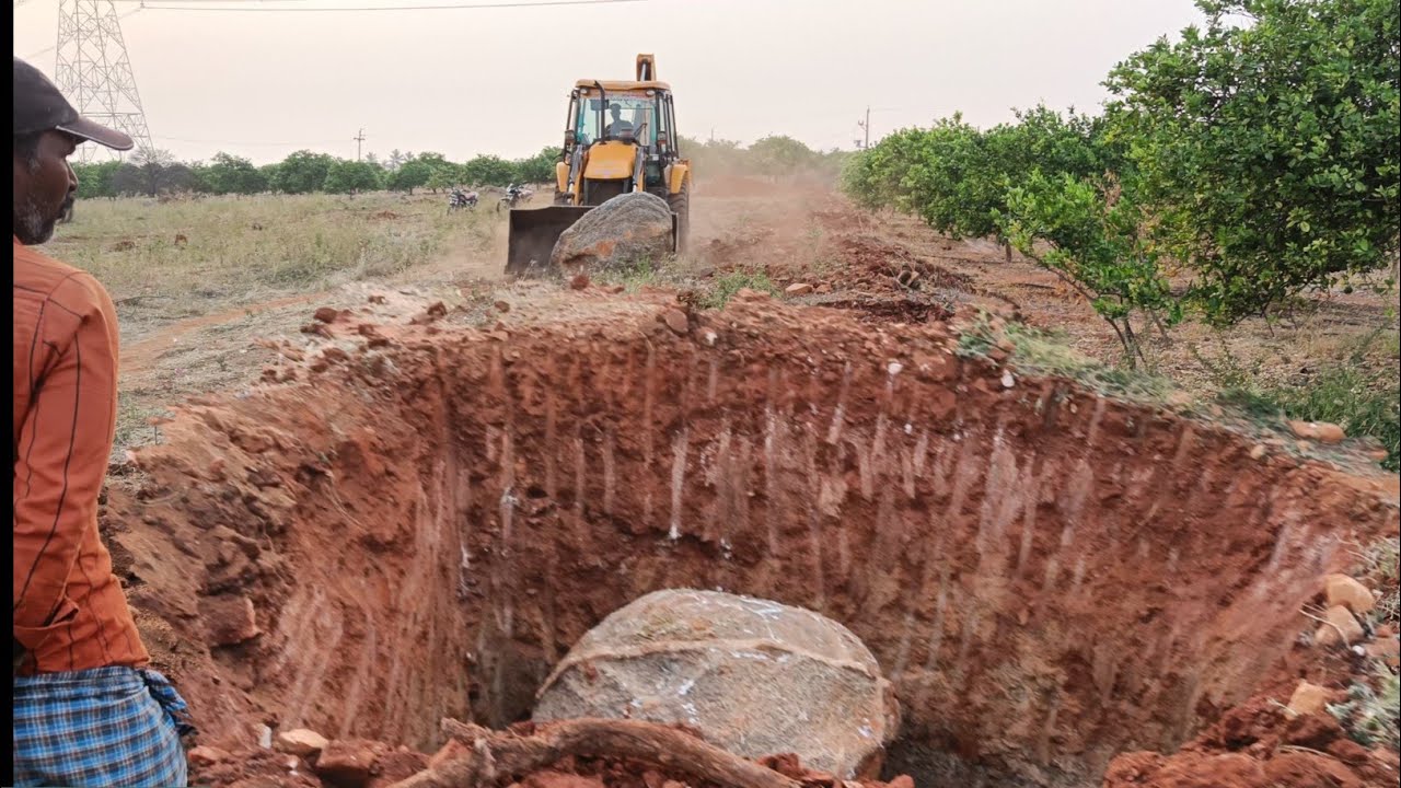 jcb 3dx super broken and moving extremely big rock/ strong jcb / excellent operator