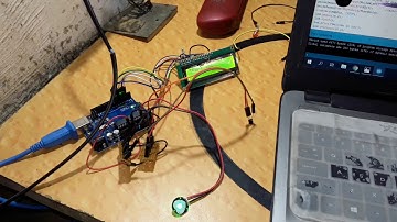 Patient heart beat and body temperature monitoring system