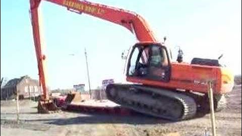 wideload excavator unloading with Charlie Kirimar