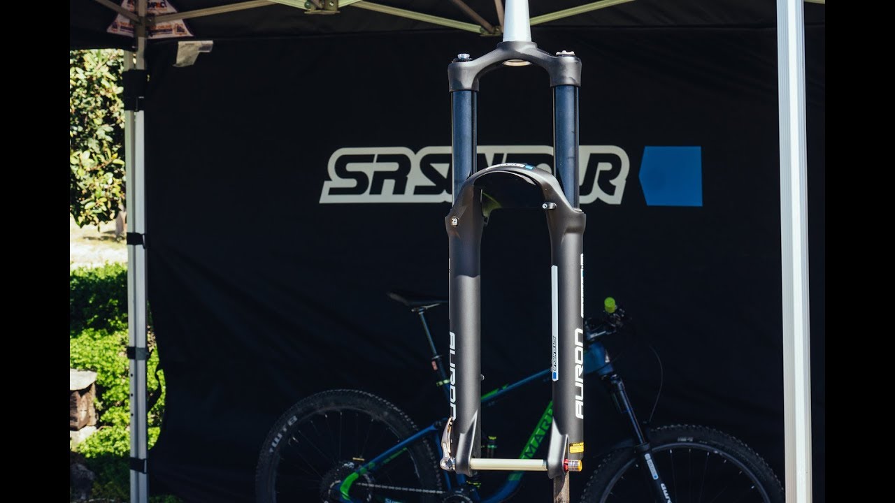Технический обзор велосипедной вилки Suntour Auron RC2