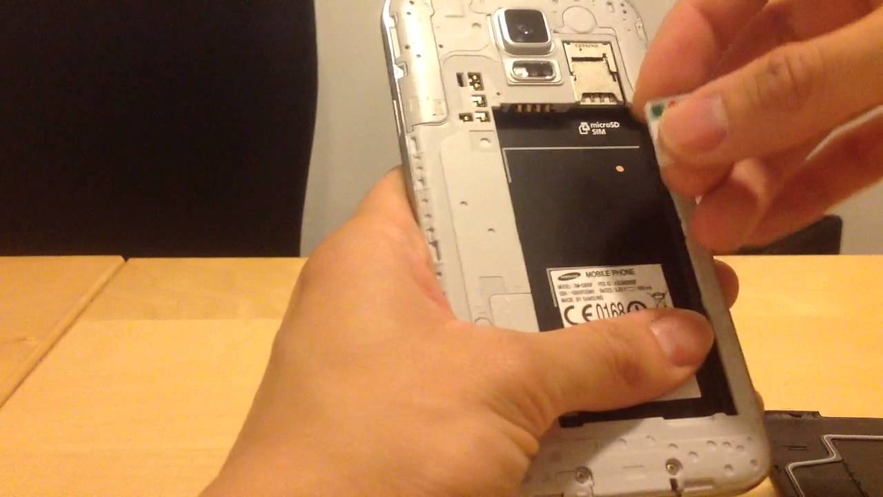 How To Insert A Micro Sim Card In The Samsung Galaxy S5 Youtube