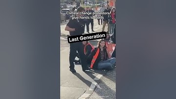 Climate Change Protestors Glue Their Hands to the Road