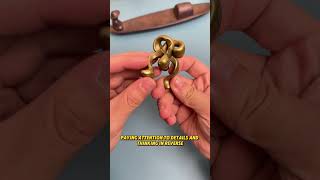 How can you separate these two interlocked brass rings? #puzzle#iq#iqtest