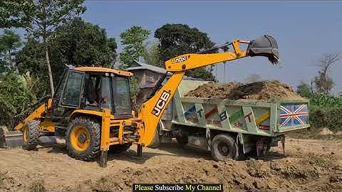 Jcb Backhoe machine loading soil in heavy truck