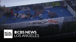 Protesters set up encampment on graduation stage at Pomona College