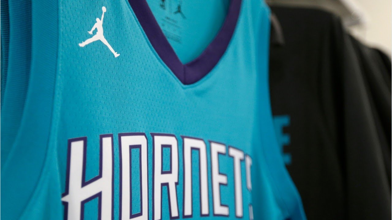 LOOK: NBA's new Nike jersey gets torn off Tyler Ennis during