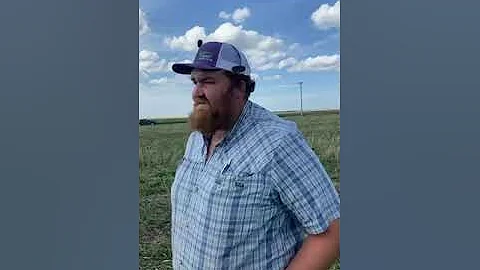 David Kleinschmidt with Austin Schweizer checking out his cover crops