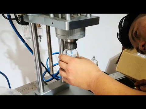 Tabletop pneumatic crimping collar fitting machine for perfumes