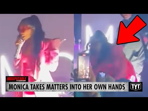 WATCH: Singer Monica Jumps Off Stage To Confront Violent Man
