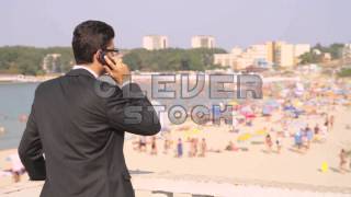 Man in Suit Business Vacation Cellphone Work Relaxation Concept - Stock Footage screenshot 1