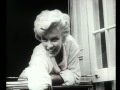 Marilyn monroe  at the window