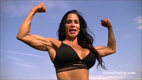 50 year old Fitness competitor Suzanne shows off h...