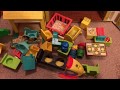 Sorting through a box of Vintage Toys - Fisher Price Little People