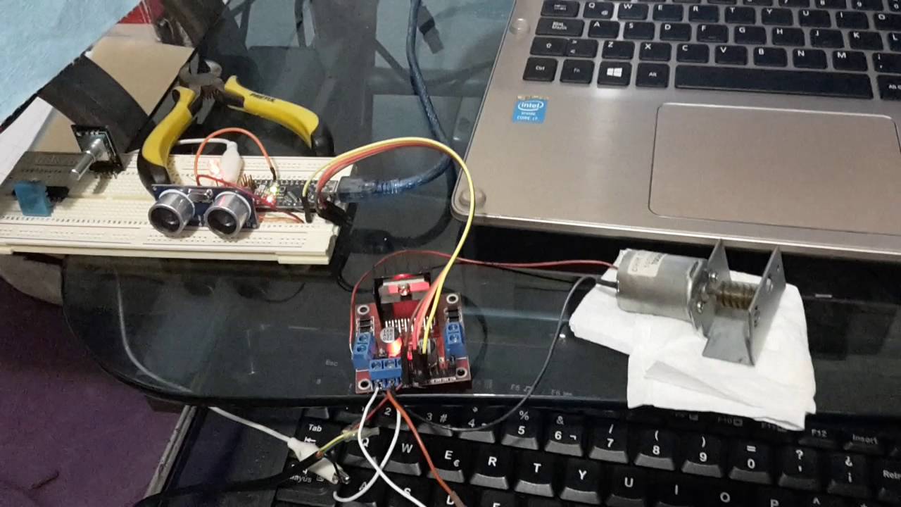 Control pwm motor arduino nano l298n y hc-s04 - YouTube