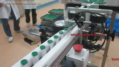 High speed vertical labeling machine for vials