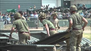 How to build a bridge in 8.5 minutes. Two teams of army engineers race against eachother to build a bridge capable of suporting military vehicles up to 120 tons.