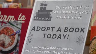 Grand Haven neighbors give back through library's Adopt a Book program