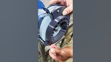 attachment for a sharpening machine for sharpening drills