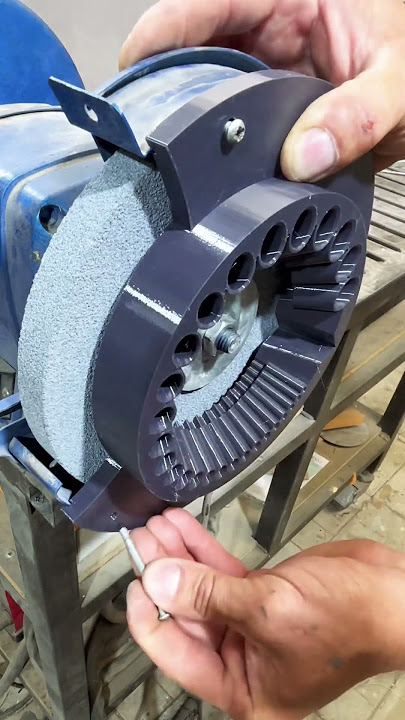 attachment for a sharpening machine for sharpening drills