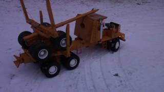 RC Kenworth Log truck playing in the snow
