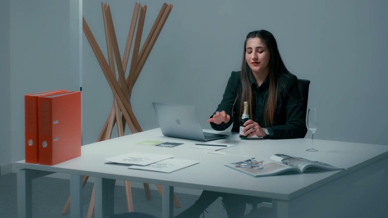 Stressed Businesswoman Reaching for Prosecco at Office Desk | Slow Motion Cinematic Shot on Sony FX3