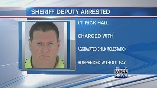 Sheriff deputy taken into custody for child molestation