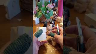 Carving a giraffe ornament