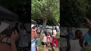 Guy hits Piñata with stick then it falls off and hits two girls on their head (Gender reveal fail)