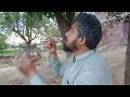 Eating blackberries from a naturally growing tree in Sialkot, Pakistan.
