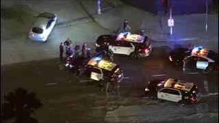 Live: LAPD officers chase possible stolen vehicle in downtown LA
