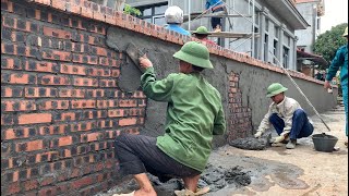 Professional Worker Skills Using Creative Tools To Support Cement Rendering On The Garden Brick Wall