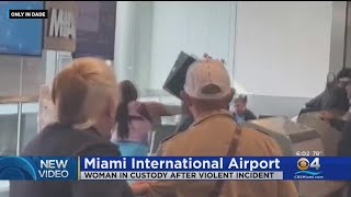 Caught on video: Woman in custody after violent incident at MIA