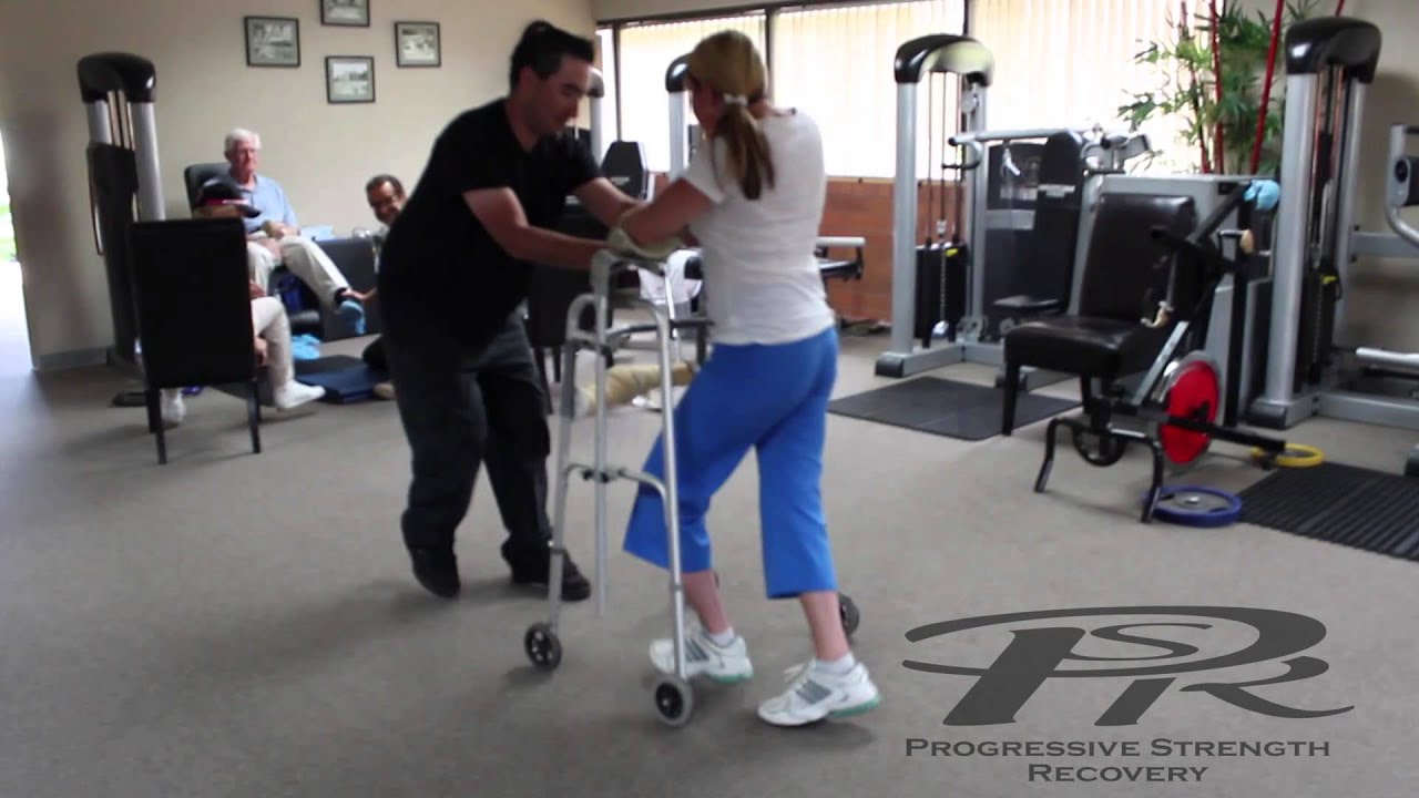 Stacy Quadriplegic walking, pedaling an exercise bike, and using her