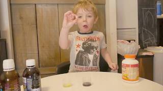 4 year old takes his daily vitamins and supplements