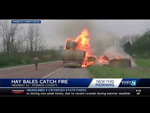 Dash cam shows truckload of hay on fire